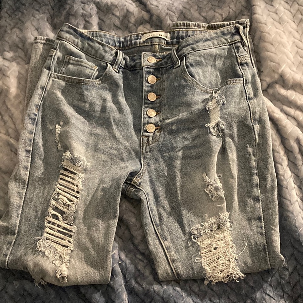 The brand is almost famous , the color is a dark blue washed Jean